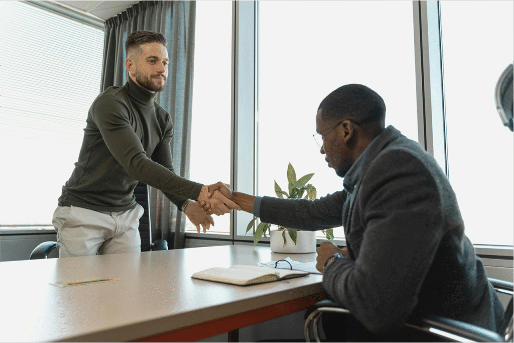 Candidate shaking hands with the interviewer